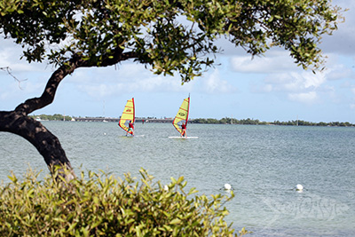Campers windsurfing in Newfound Harbor at Seacamp